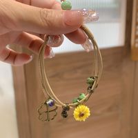 Casual Simple Style Four Leaf Clover Butterfly Daisy Baroque Pearls Ceramics Beaded Plating Braid White Gold Plated Women's Bracelets main image 7