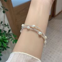 Casual Estilo Simple Trébol De Cuatro Hojas Mariposa Margarita Perlas Barrocas Cerámica Con Cuentas Enchapado Trenza Blanco Oro Plateado Mujeres Pulsera main image 6