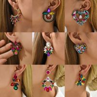 1 Pair Exaggerated Luxurious Shiny Round Heart Shape Wings Plating Inlay Copper Alloy Zinc Alloy Rhinestones Glass Ear Studs main image 10