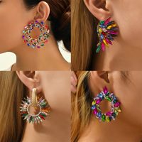 1 Pair Exaggerated Luxurious Shiny Round Heart Shape Wings Plating Inlay Copper Alloy Zinc Alloy Rhinestones Glass Ear Studs main image 1