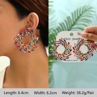 1 Pair Exaggerated Luxurious Shiny Round Heart Shape Wings Plating Inlay Copper Alloy Zinc Alloy Rhinestones Glass Ear Studs main image 3