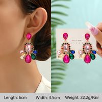 1 Pair Exaggerated Luxurious Shiny Round Heart Shape Wings Plating Inlay Copper Alloy Zinc Alloy Rhinestones Glass Ear Studs main image 2