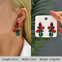 1 Pair Exaggerated Luxurious Shiny Round Heart Shape Wings Plating Inlay Copper Alloy Zinc Alloy Rhinestones Glass Ear Studs sku image 6