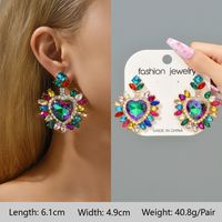 1 Pair Exaggerated Luxurious Shiny Round Heart Shape Wings Plating Inlay Copper Alloy Zinc Alloy Rhinestones Glass Ear Studs sku image 25