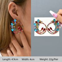 1 Pair Exaggerated Luxurious Shiny Round Heart Shape Wings Plating Inlay Copper Alloy Zinc Alloy Rhinestones Glass Ear Studs sku image 9