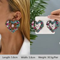 1 Pair Exaggerated Luxurious Shiny Round Heart Shape Wings Plating Inlay Copper Alloy Zinc Alloy Rhinestones Glass Ear Studs sku image 15