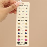 1 Set Casual Simple Style Commute Geometric Flower Inlay Alloy Artificial Rhinestones Artificial Pearls Ear Studs main image 5