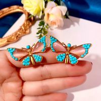 1 Pair Ethnic Style Water Droplets Butterfly Inlay Alloy Resin Earrings main image 5