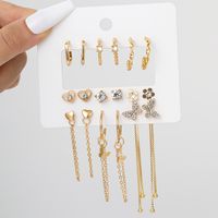 9 Pairs Elegant Shiny Tassel Heart Shape Butterfly Plating Inlay Imitation Pearl Alloy Artificial Gemstones Artificial Pearls Rhinestones Gold Plated Silver Plated Earrings sku image 2