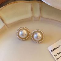 1 Pair Simple Style Round Inlay Alloy Pearl Ear Studs main image 1