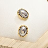 1 Pair Simple Style Oval Inlay Alloy Pearl Ear Studs main image 4