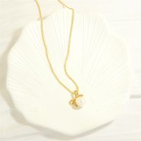 Elegant Simple Style Bow Knot Freshwater Pearl Copper Plating Inlay Zircon 18k Gold Plated Pendant Necklace main image 6