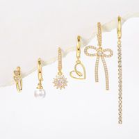 1 Set Elegant Simple Style Tassel Heart Shape Bow Knot Plating Inlay Imitation Pearl Brass Zircon 18k Gold Plated Earrings main image 1