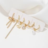 1 Set Elegant Simple Style Tassel Heart Shape Bow Knot Plating Inlay Imitation Pearl Brass Zircon 18k Gold Plated Earrings main image 4