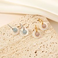 1 Pair Simple Style Flower Shell Titanium Steel Earrings main image 1