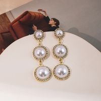 1 Pair Vintage Style Simple Style Geometric Inlay Alloy Artificial Pearls Drop Earrings main image 1