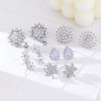 1 Pair Glam Simple Style Water Droplets Flower Snowflake Irregular Plating Inlay Copper Zircon Rhodium Plated Ear Studs main image 1