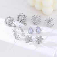 1 Pair Glam Simple Style Water Droplets Flower Snowflake Irregular Plating Inlay Copper Zircon Rhodium Plated Ear Studs main image 11