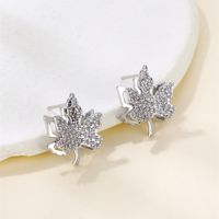 1 Pair Glam Simple Style Water Droplets Flower Snowflake Irregular Plating Inlay Copper Zircon Rhodium Plated Ear Studs main image 4