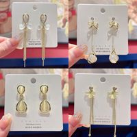 1 Pair Fairy Style Heart Shape Flower Bow Knot Inlay Opal Opal Ear Studs main image 4