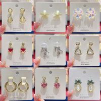 1 Pair Fairy Style Heart Shape Flower Bow Knot Inlay Opal Opal Ear Studs main image 2