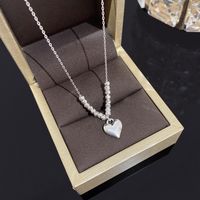 Simple Style Heart Shape Flower Bow Knot Titanium Steel Copper Plating Inlay Artificial Gemstones Pendant Necklace sku image 1