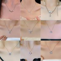 Simple Style Heart Shape Flower Bow Knot Titanium Steel Copper Plating Inlay Artificial Gemstones Pendant Necklace main image 2