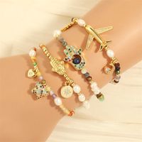 Bohemian Pentagram Hand Of Fatima Airplane Artificial Gemstones Freshwater Pearl Copper 18k Gold Plated Zircon Bracelets In Bulk main image 1