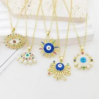 Ig Style Casual Devil's Eye Star Moon Copper Enamel Plating Inlay Pearl Zircon 18k Gold Plated Pendant Necklace main image 1