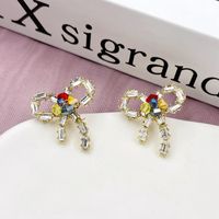 1 Pair Simple Style Bow Knot Inlay Alloy Zircon Ear Studs main image 1