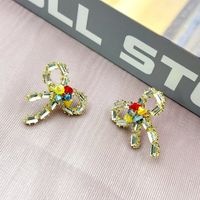 1 Pair Simple Style Bow Knot Inlay Alloy Zircon Ear Studs main image 5