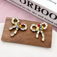 1 Pair Simple Style Bow Knot Inlay Alloy Zircon Ear Studs main image 4