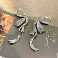 1 Pair Ig Style Korean Style Bow Knot Inlay Alloy Rhinestones Drop Earrings main image 1