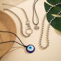 Wholesale Jewelry Modern Style Tassel Eye Lotus Alloy Plastic Iron Irregular Tassel Necklace main image 4