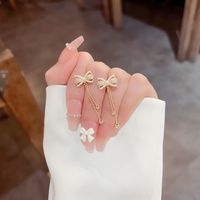 1 Pair Simple Style Bow Knot Inlay Alloy Artificial Gemstones Pearl Drop Earrings main image 2