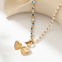 Cute Sweet Heart Shape Eye Imitation Pearl Natural Stone Copper Pendant Necklace In Bulk main image 3