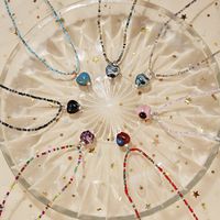 Einfacher Stil Herzform Glas Reis Perlen Keramik Perlen Frau Halskette Mit Anhänger main image 1