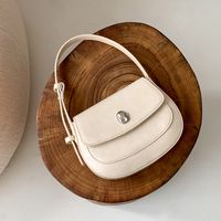 Women's Medium Pu Leather Solid Color Elegant Oval Flip Cover Shoulder Bag sku image 5