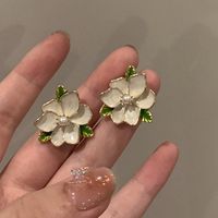1 Pair Ig Style Sweet Heart Shape Flower Bow Knot Inlay Imitation Pearl Alloy Opal Earrings main image 3