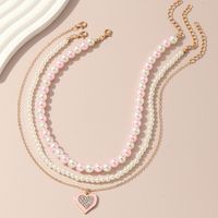 Cute Sweet Heart Shape Artificial Diamond Artificial Pearl Metal Wholesale Pendant Necklace Necklace main image 4
