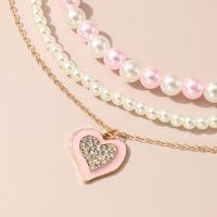 Cute Sweet Heart Shape Artificial Diamond Artificial Pearl Metal Wholesale Pendant Necklace Necklace main image 2