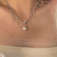 Simple Style Bow Knot Imitation Pearl Patchwork Women's Pendant Necklace main image 4