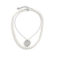 Princess Simple Style Cool Style Heart Shape Imitation Pearl Alloy Copper Women's Pendant Necklace main image 3