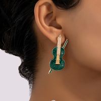 1 Pair Ig Style Retro Lady Violin Plating Inlay Alloy Artificial Pearls 14k Gold Plated Ear Studs main image 1