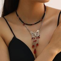 Gothic Hip-hop Exaggerated Butterfly Alloy Layered Tassel Inlay Glass Stone Women's Pendant Necklace main image 1