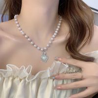 Élégant Style Simple Forme De Cœur Alliage Perlé Incruster Perles Artificielles Femmes Collier main image 1