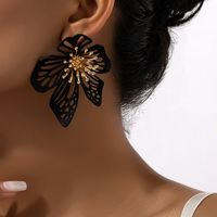 1 Pair Simple Style Flower Plating Hollow Out Metal Ear Studs main image 5