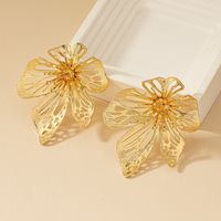 1 Pair Simple Style Flower Plating Hollow Out Metal Ear Studs main image 1