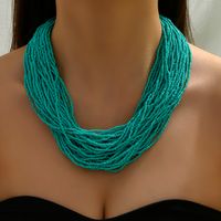 Style Ethnique Romantique Couleur Unie Rond Plastique Perle De Rocaille Perlé Chaîne Femmes Collier En Couches Chaîne De Chandail main image 9