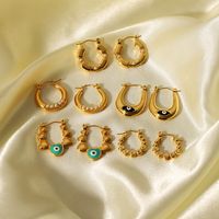 1 Pair Vintage Style Devil'S Eye Heart Shape Plating Inlay 201 Stainless Steel Rhinestones Pearl 18K Gold Plated Hoop Earrings main image 2